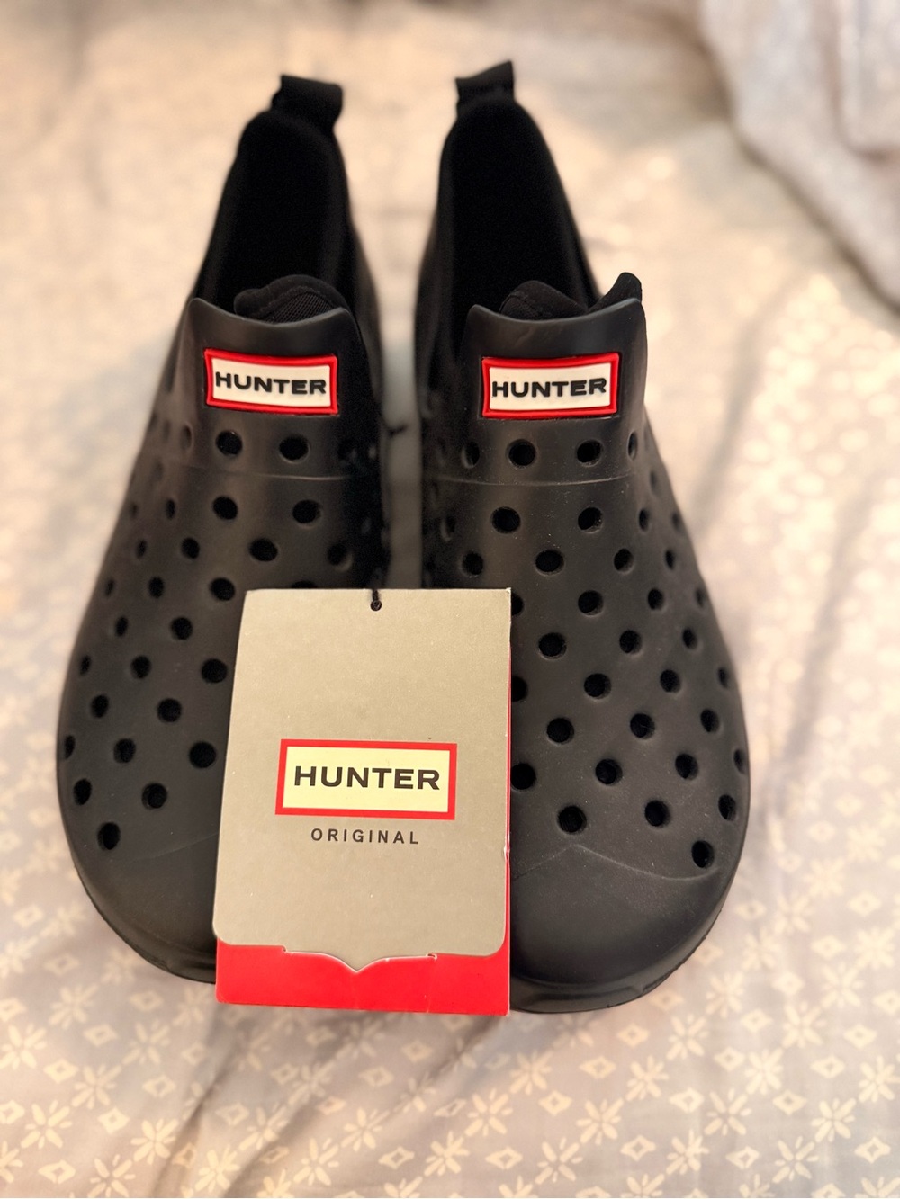 Hunter Black Perforated Slip-On Clogs with Red Logo